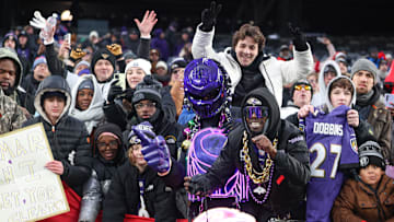 Dec 15, 2024; East Rutherford, New Jersey, USA; Baltimore Ravens fans cheer after the game against the New York Giants at MetLife Stadium. Mandatory Credit: Vincent Carchietta-Imagn Images