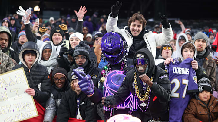 Dec 15, 2024; East Rutherford, New Jersey, USA; Baltimore Ravens fans cheer after the game against the New York Giants at MetLife Stadium. Mandatory Credit: Vincent Carchietta-Imagn Images