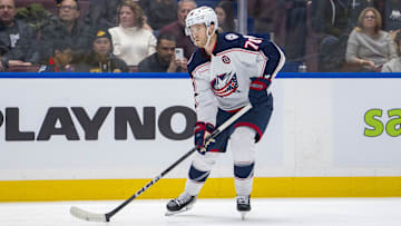 Dec 6, 2024; Vancouver, British Columbia, CAN; Columbus Blue Jackets defenseman Damon Severson (78) handles the puck against the Vancouver Canucks during the first period at Rogers Arena. Mandatory Credit: Bob Frid-Imagn Images