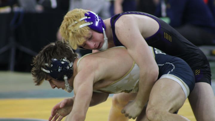 Blissfield's Gage Rothman wrestles Cameron Perez of Lakeview in a Division 4 132-pound consolation match at the MHSAA individual state championships at Ford Field. Blissfield's Gage Rothman wrestles Cameron Perez of Lakeview in a Division 4 132-pound consolation match at the MHSAA individual state championships at Ford Field.