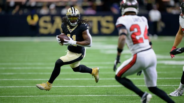 New Orleans Saints running back Alvin Kamara (41) runs for yardage against the Tampa Bay Buccaneers 