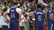 Jul 28, 2024; Villeneuve-d'Ascq, France; United States head coach Steve Kerr talks to the team during a timeout  in the first quarter against Serbia during the Paris 2024 Olympic Summer Games at Stade Pierre-Mauroy. Mandatory Credit: John David Mercer-USA TODAY Sports