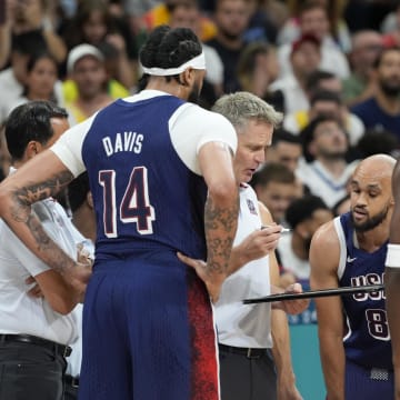 Jul 28, 2024; Villeneuve-d'Ascq, France; United States head coach Steve Kerr talks to the team during a timeout  in the first quarter against Serbia during the Paris 2024 Olympic Summer Games at Stade Pierre-Mauroy. Mandatory Credit: John David Mercer-USA TODAY Sports