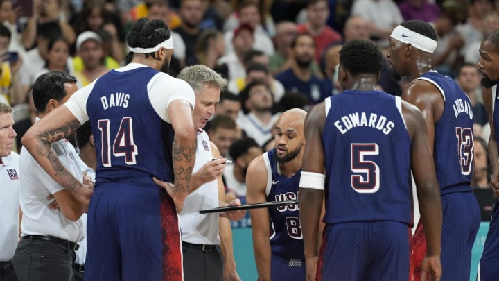 Jul 28, 2024; Villeneuve-d'Ascq, France; United States head coach Steve Kerr talks to the team during a timeout  in the first quarter against Serbia during the Paris 2024 Olympic Summer Games at Stade Pierre-Mauroy. Mandatory Credit: John David Mercer-USA TODAY Sports