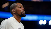 Jan 31, 2025; San Francisco, California, USA; Phoenix Suns forward Kevin Durant (35) stands on the court before the start of the game against the Golden State Warriors at the Chase Center. Mandatory Credit: Cary Edmondson-Imagn Images