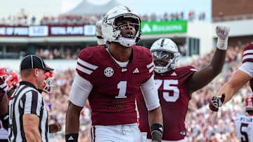 Nov 8, 2025; Starkville, Mississippi, USA; Mississippi State Bulldogs quarterback Kamario Taylor (1) reacts after a touchdown against the Georgia Bulldogs during the first half at Davis Wade Stadium at Scott Field. Mandatory Credit: Wesley Hale-Imagn Images