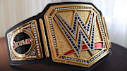 A custom WWE Championship with a Netflix side plate.