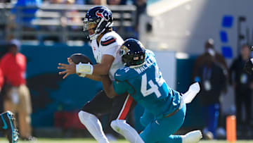 Jacksonville Jaguars defensive end Travon Walker (44) sacks Houston Texans quarterback C.J. Stroud (7) during the first quarter of an NFL football matchup Sunday, Dec. 1, 2024 at EverBank Stadium in Jacksonville, Fla.