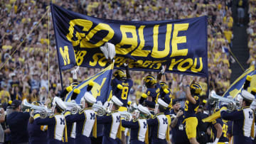 Aug 31, 2024; Ann Arbor, Michigan, USA;  Michigan Wolverines players take the field before a game against the Fresno State Bulldogs at Michigan Stadium. Mandatory Credit: Rick Osentoski-USA TODAY Sports