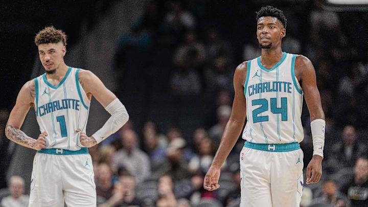Oct 8, 2024; Charlotte, North Carolina, USA; Charlotte Hornets guard LaMelo Ball (1) and forward Brandon Miller (24) at mid court against the Miami Heat during the second half at Spectrum Center. Mandatory Credit: Jim Dedmon-Imagn Images Oct 8, 2024; Charlotte, North Carolina, USA; Charlotte Hornets guard LaMelo Ball (1) and forward Brandon Miller (24) at mid court against the Miami Heat during the second half at Spectrum Center. Mandatory Credit: Jim Dedmon-Imagn Images