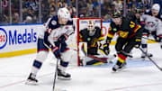 Dec 6, 2024; Vancouver, British Columbia, CAN; Vancouver Canucks defenseman Noah Juulsen (47) defends against Columbus Blue Jackets forward Mathieu Olivier (24) during the third period at Rogers Arena. Mandatory Credit: Bob Frid-Imagn Images