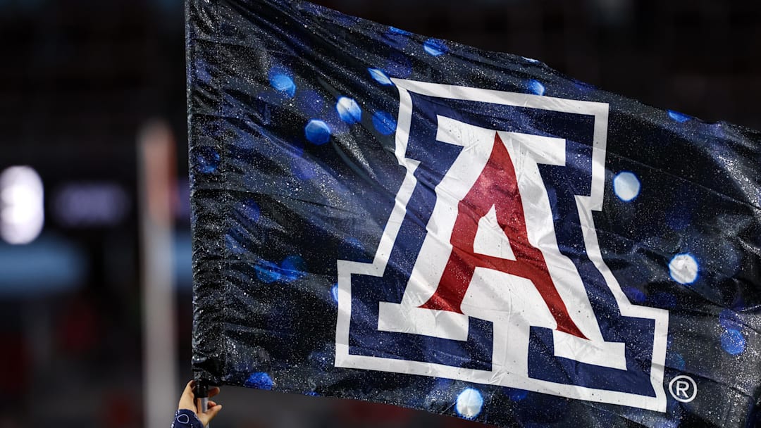 Sep 7, 2024; Tucson, Arizona, USA; Arizona Wildcats flag waves in the air right before a game against the Northern Arizona Lumberjacks at Arizona Stadium. Mandatory Credit: Aryanna Frank-Imagn Images