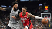 Nov 7, 2025; San Antonio, Texas, USA;  Houston Rockets forward Jabari Smith Jr (10) dribbles against San Antonio Spurs forward Julian Champagnie (30) during the second quarter at Frost Bank Center. Mandatory Credit: Dustin Safranek-Imagn Images