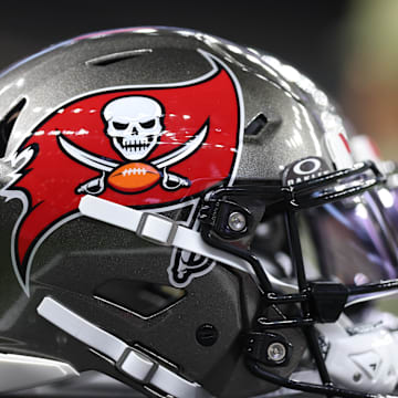 A Tampa Bay Buccaneers helmet is seen on the sidelines prior to a game against the New Orleans Saints