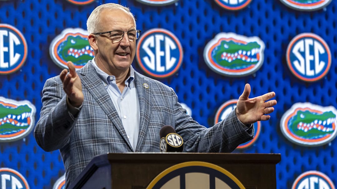 SEC commissioner Greg Sankey introduces Florida head coach Todd Golden during SEC Media Days at Grand Bohemian Hotel. 