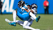Jacksonville Jaguars wide receiver Brian Thomas Jr. (7) is tackled by Seattle Seahawks safety Nick Emmanwori (3) during the fourth quarter of an NFL football matchup, Sunday, Oct. 12, 2025, at EverBank Stadium in Jacksonville, Fla. The Seahawks defeated the Jaguars 20-12.