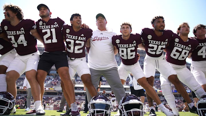 Sep 7, 2024; College Station, Texas, USA; Texas A&M Aggies head coach Mike Elko celebrates a 52-10 win against the McNeese State Cowboys at Kyle Field. 