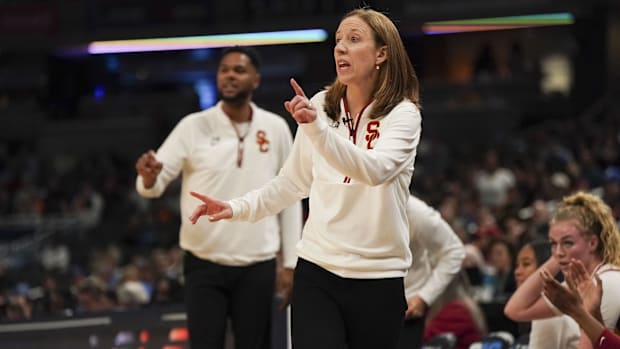 Mar 8, 2025; Indianapolis, IN, USA; USC Trojans head coach Lindsay Gottlieb communicate with her player as they play against 