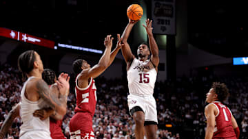 Jan 11, 2025; College Station, Texas, USA; Texas A&M Aggies forward Henry Coleman III (15) shoots inside against the Alabama Crimson Tide during the first half at Reed Arena.