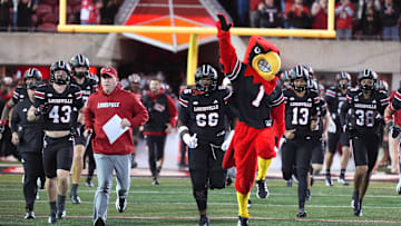 Louisville comes out onto the field before the game against Boston College Saturday night at L&N Stadium.
Oct. 25, 2025