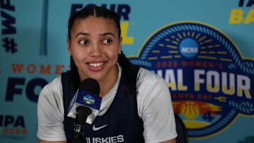 Apr 5, 2025; Tampa, FL, USA; UConn Huskies guard Azzi Fudd (35) talks to media before the NCAA Woman’s Final practice at Amalie Arena. Mandatory Credit: Nathan Ray Seebeck-Imagn Images