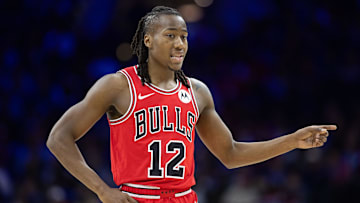 Jan 2, 2024; Philadelphia, Pennsylvania, USA; Chicago Bulls guard Ayo Dosunmu (12) reacts to a play against the Philadelphia 76ers during the second quarter at Wells Fargo Center. Mandatory Credit: Bill Streicher-Imagn Images