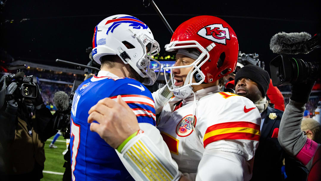 Jan 21, 2024; Orchard Park, New York, USA; Kansas City Chiefs quarterback Patrick Mahomes (15) greets Buffalo Bills quarterback Josh Allen (17) following the 2024 AFC divisional round game at Highmark Stadium. Mandatory Credit: Mark J. Rebilas-Imagn Images