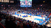 Fans yell out as the Kansas Jayhawks enter the court before the game against Texas A&M-Corpus Christi Islanders inside Allen Fieldhouse on Nov. 11, 2025.