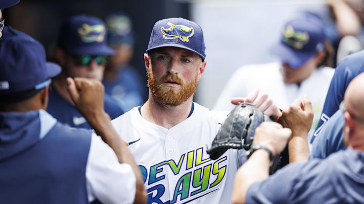 Aug 2, 2025; St. Petersburg, Florida, USA; Tampa Bay Rays starting pitcher Drew Rasmussen (57) high fives teammates after being substituted against the Los Angeles Dodgers during the sixth inning at George M. Steinbrenner Field. Mandatory Credit: Morgan Tencza-Imagn Images