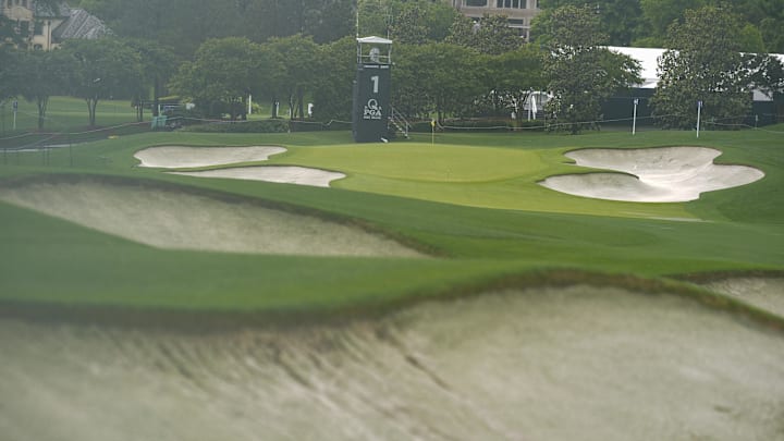 Quail Hollow had an inch of rain Monday and spectators were not permitted on the grounds. Quail Hollow had an inch of rain Monday and spectators were not permitted on the grounds.