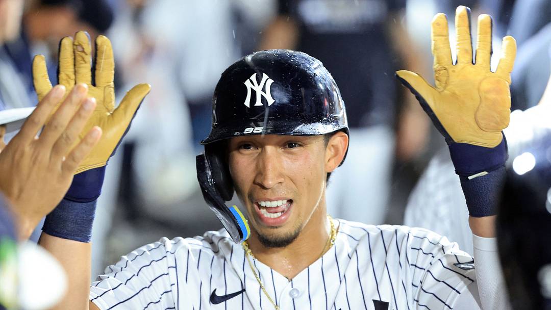 Mar 6, 2026; Tampa, Florida, USA; New York Yankees infielder Oswaldo Cabrera (95)  is congratulated after scoring a run during the second inning against the Tampa Bay Rays at George M. Steinbrenner Field. Mandatory Credit: Kim Klement Neitzel-Imagn Images