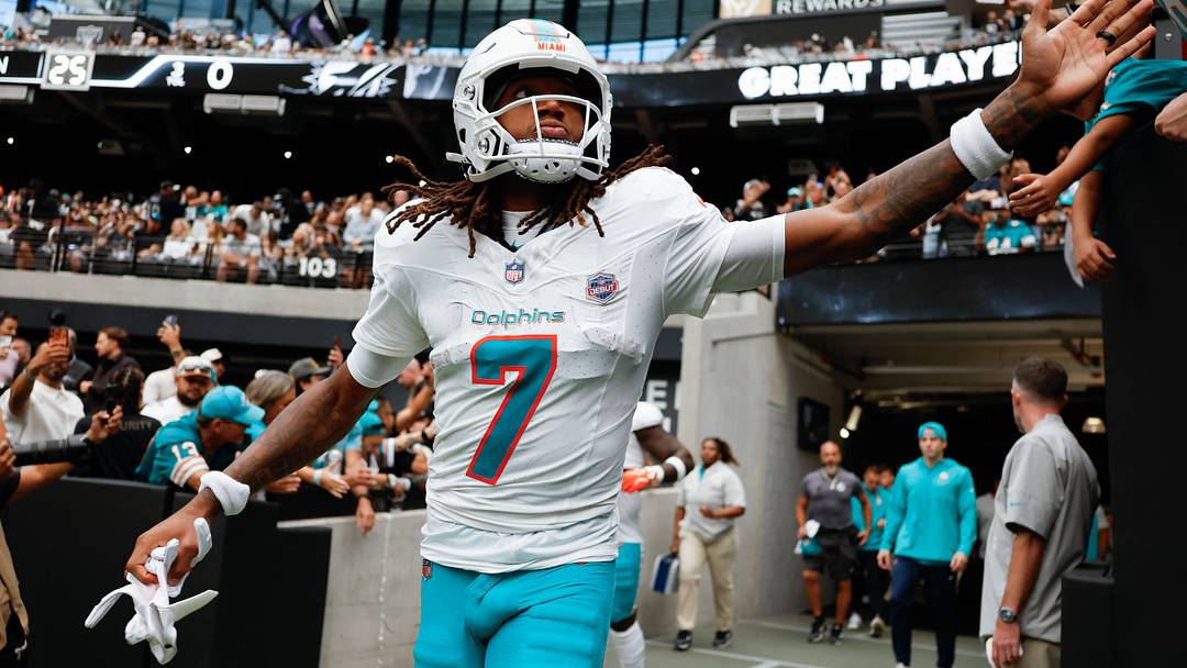 Miami Dolphins wide receiver Caleb Douglas (7) walks onto the field before the game against the Las Vegas Raiders at Allegiant Stadium. Miami Dolphins wide receiver Caleb Douglas (7) walks onto the field before the game against the Las Vegas Raiders at Allegiant Stadium.