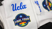 Apr 3, 2025; Tampa, FL, USA; UCLA towels sit on the court before the NCAA Woman’s Final Four at Amalie Arena. Mandatory Credit: Nathan Ray Seebeck-Imagn Images