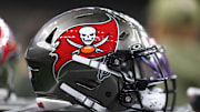 A Tampa Bay Buccaneers helmet is seen on the sidelines prior to a game against the New Orleans Saints 