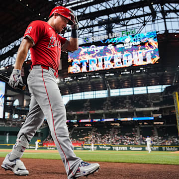 Apr 16, 2025; Arlington, Texas, USA; Los Angeles Angels center fielder Mike Trout (27) walks to the on deck circle during the first inning against the Texas Rangers at Globe Life Field. Mandatory Credit: Raymond Carlin III-Imagn Images