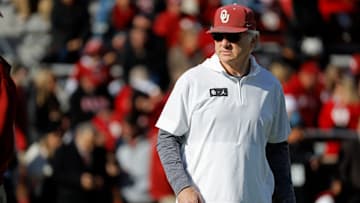 Oklahoma defensive coordinator Ted Roof watches the Sooners warm up before a college football game between the University of Oklahoma Sooners (OU) and the TCU Horned Frogs at Gaylord Family-Oklahoma Memorial Stadium in Norman, Okla., Friday, Nov. 24, 2023. Oklahoma won 69-45.