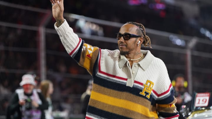 Nov 18, 2023; Las Vegas, Nevada, USA;  Mercedes AMG Petronas Motorsport driver Lewis Hamilton of Great Britain (44) waves to fans during the Formula 1 Heineken Silver Las Vegas Grand Prix begins at the Las Vegas Strip Circuit. Mandatory Credit: Lucas Peltier-USA TODAY Sports