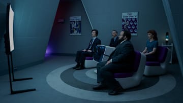 Adam Scott, John Turturro, Zach Cherry and Britt Lower in "Severance," now streaming on Apple TV+.
