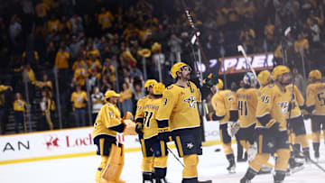 Oct 26, 2024; Nashville, Tennessee, USA; Nashville Predators left wing Filip Forsberg (9) celebrates an overtime win against the Columbus Blue Jackets after the game at Bridgestone Arena. Mandatory Credit: Casey Gower-Imagn Images