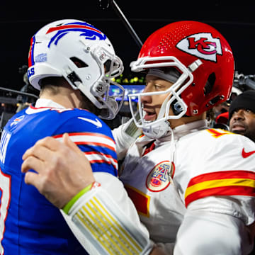 Jan 21, 2024; Orchard Park, New York, USA; Kansas City Chiefs quarterback Patrick Mahomes (15) greets Buffalo Bills quarterback Josh Allen (17) following the 2024 AFC divisional round game at Highmark Stadium. 