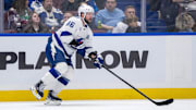 Dec 8, 2024; Vancouver, British Columbia, CAN; Tampa Bay Lightning forward Nikita Kucherov (86) handles the puck against the Vancouver Canucks during the second period at Rogers Arena. Mandatory Credit: Bob Frid-Imagn Images