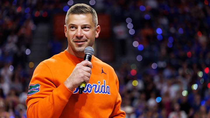 Jan 24, 2026; Gainesville, Florida, USA; Florida Gators Football head coach Jon Sumrall addresses the crowd during a timeout against the Auburn Tigers during the first half.