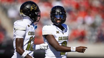 Oct 19, 2024; Tucson, Arizona, USA; Colorado Buffalos quarterback Shedeur Sanders (2) with wide receiver Travis Hunter (12) against the Arizona Wildcats at Arizona Stadium. Mandatory Credit: Mark J. Rebilas-Imagn Images