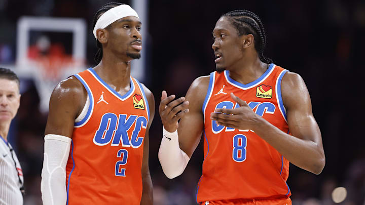 Nov 10, 2024; Oklahoma City, Oklahoma, USA; Oklahoma City Thunder guard Shai Gilgeous-Alexander (2) and forward Jalen Williams (8) talk during a time out against the Golden State Warriors during the second half at Paycom Center. Mandatory Credit: Alonzo Adams-Imagn Images