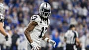 Dec 31, 2023; Indianapolis, Indiana, USA; Las Vegas Raiders wide receiver Davante Adams (17) celebrates his touchdown  in the second half  against the Indianapolis Colts at Lucas Oil Stadium. Mandatory Credit: Trevor Ruszkowski-Imagn Images
