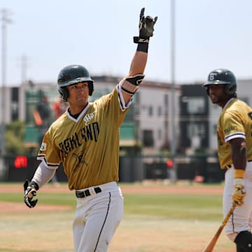 Josh Leslie of the Oakland Ballers points to the crowd