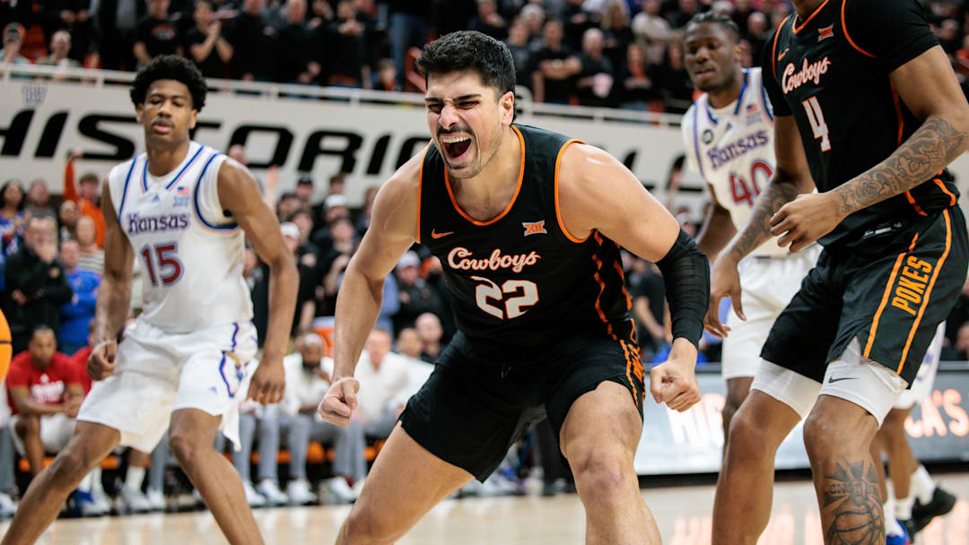 Feb 18, 2026; Stillwater, Oklahoma, USA; Oklahoma State Cowboys forward Parsa Fallah (22) reacts to a play during the first half against the Kansas Jayhawks at Gallagher-Iba Arena. Mandatory Credit: William Purnell-Imagn Images