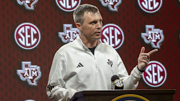 Oct 15, 2025; Birmingham, AL, USA; Texas A&M Aggies head coach Bucky McMillan talks with the media during SEC Media Days at Grand Bohemian Hotel. Mandatory Credit: Vasha Hunt-Imagn Images