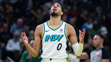 Dec 31, 2024; Indianapolis, Indiana, USA; Indiana Pacers guard Tyrese Haliburton (0) reacts to a call  in the first half against the Milwaukee Bucks at Gainbridge Fieldhouse. Mandatory Credit: Trevor Ruszkowski-Imagn Images