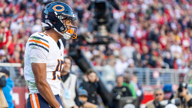 Chicago Bears wide receiver Rome Odunze (15) celebrates a touchdown